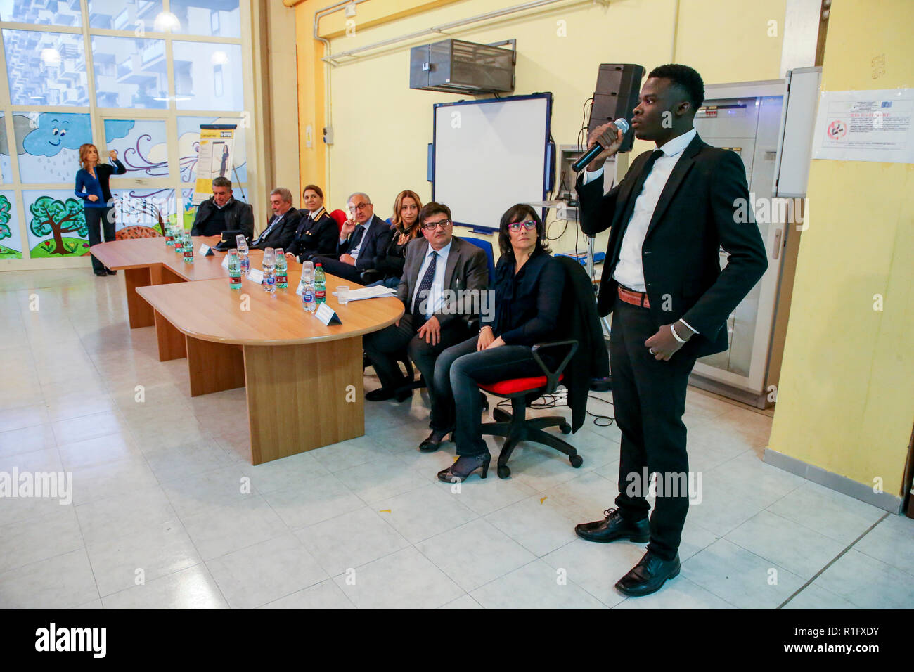Caserta, Campania, Italy, 12th Nov 2018. School V ¡ educational circle of Caserta first in Italy to include asylum seekers in its staff in photo Kone Sonta Iassinam during the presentation speech he will take care of the front office activity in the secretary of the institute Credit: Antonio Balasco/Alamy Live News Stock Photo