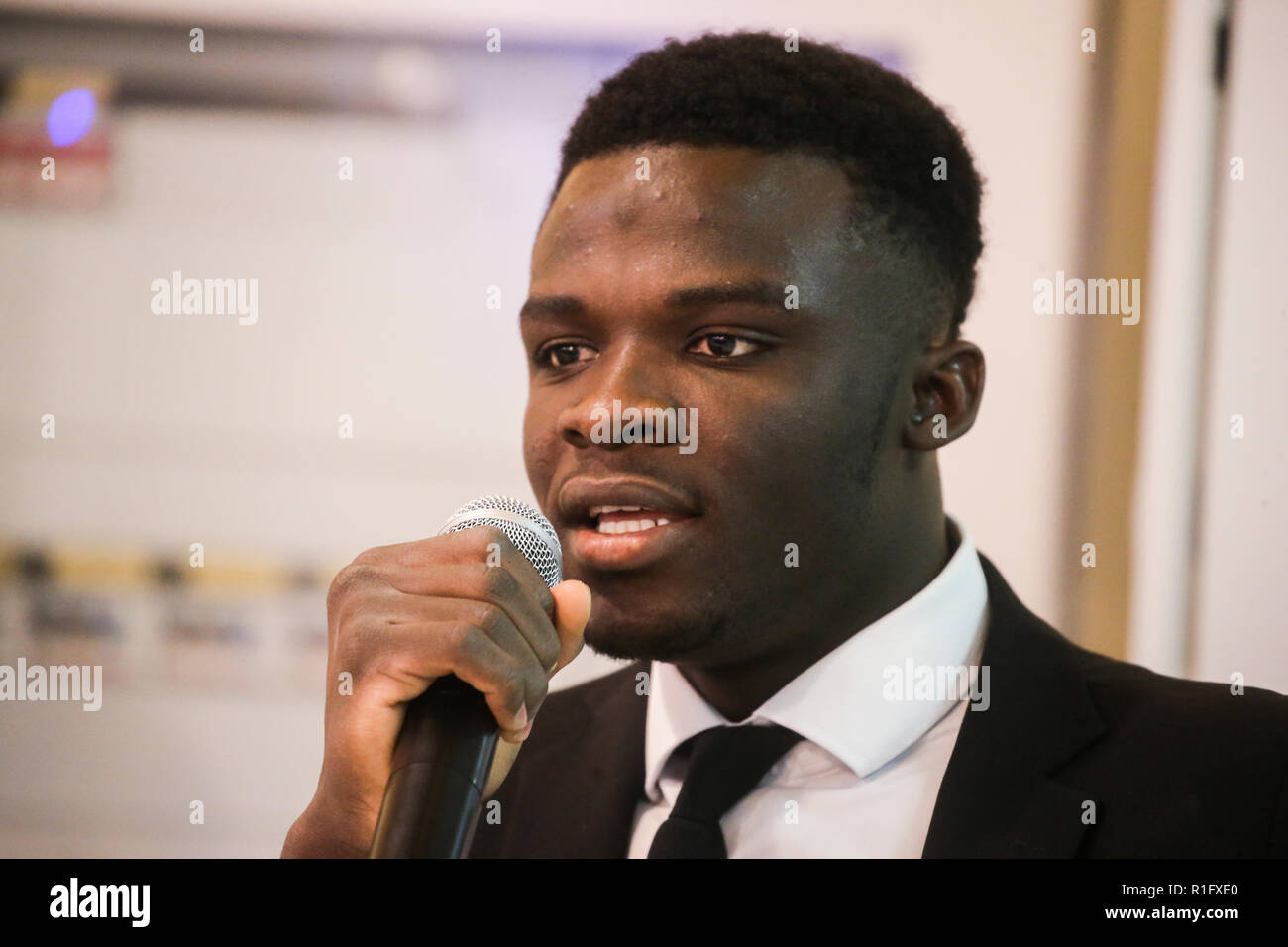 Caserta, Campania, Italy, 12th Nov 2018. School V ¡ educational circle of Caserta first in Italy to include asylum seekers in its staff in photo Kone Sonta Iassinam during the presentation speech he will take care of the front office activity in the secretary of the institute Credit: Antonio Balasco/Alamy Live News Stock Photo