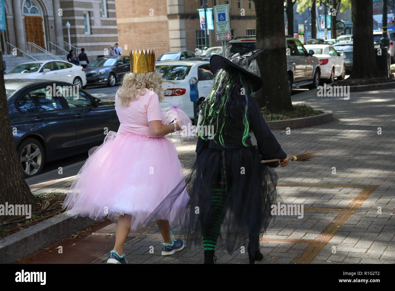 CHARLOTTE, NC, USA10/31/18 Two women dressed for Halloween as good