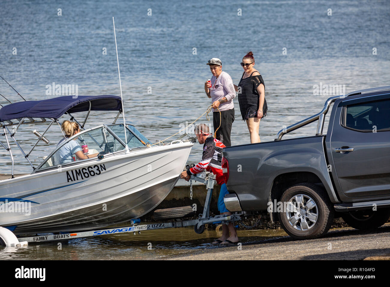 Family Launching Their Motor Boat For A Day Fishing At Deerubbun