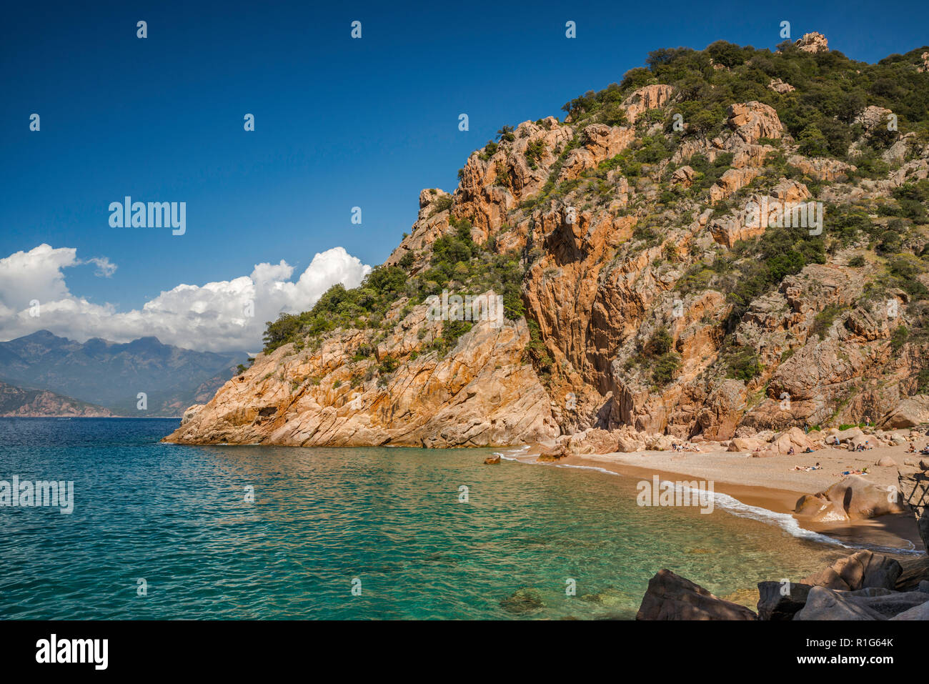 Beach at Anse de Ficajola, cove at Les Calanche de Piana, UNESCO World Heritage Site, near town of Piana, Corse-du-Sud, Corsica, France Stock Photo