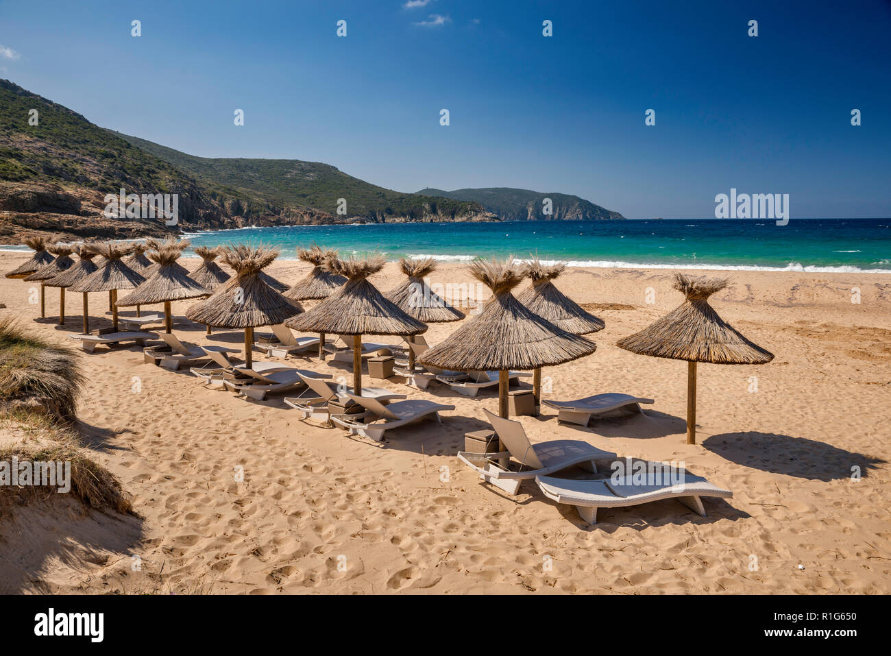 Straw Beach Umbrellas And Loungers At Plage Darone Near