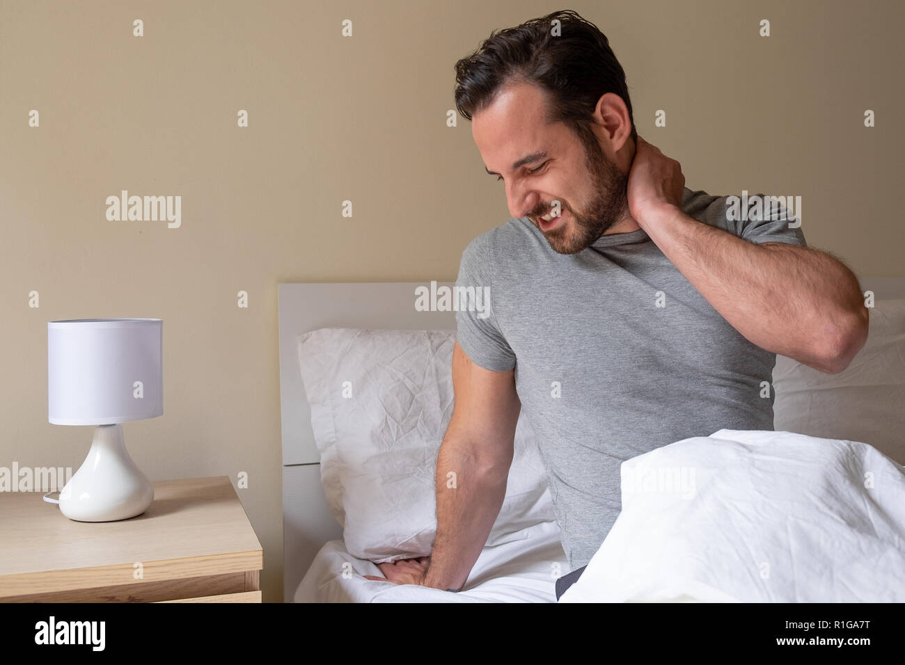 Stiff neck hires stock photography and images Alamy