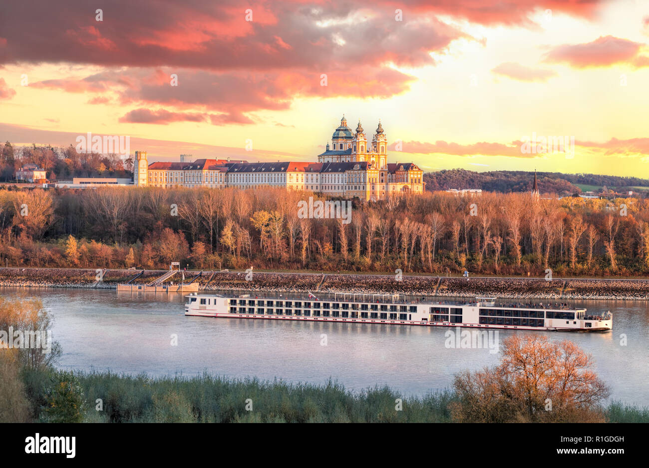 Panorama of Melk abbey with Danube river and autumn forest Stock Photo