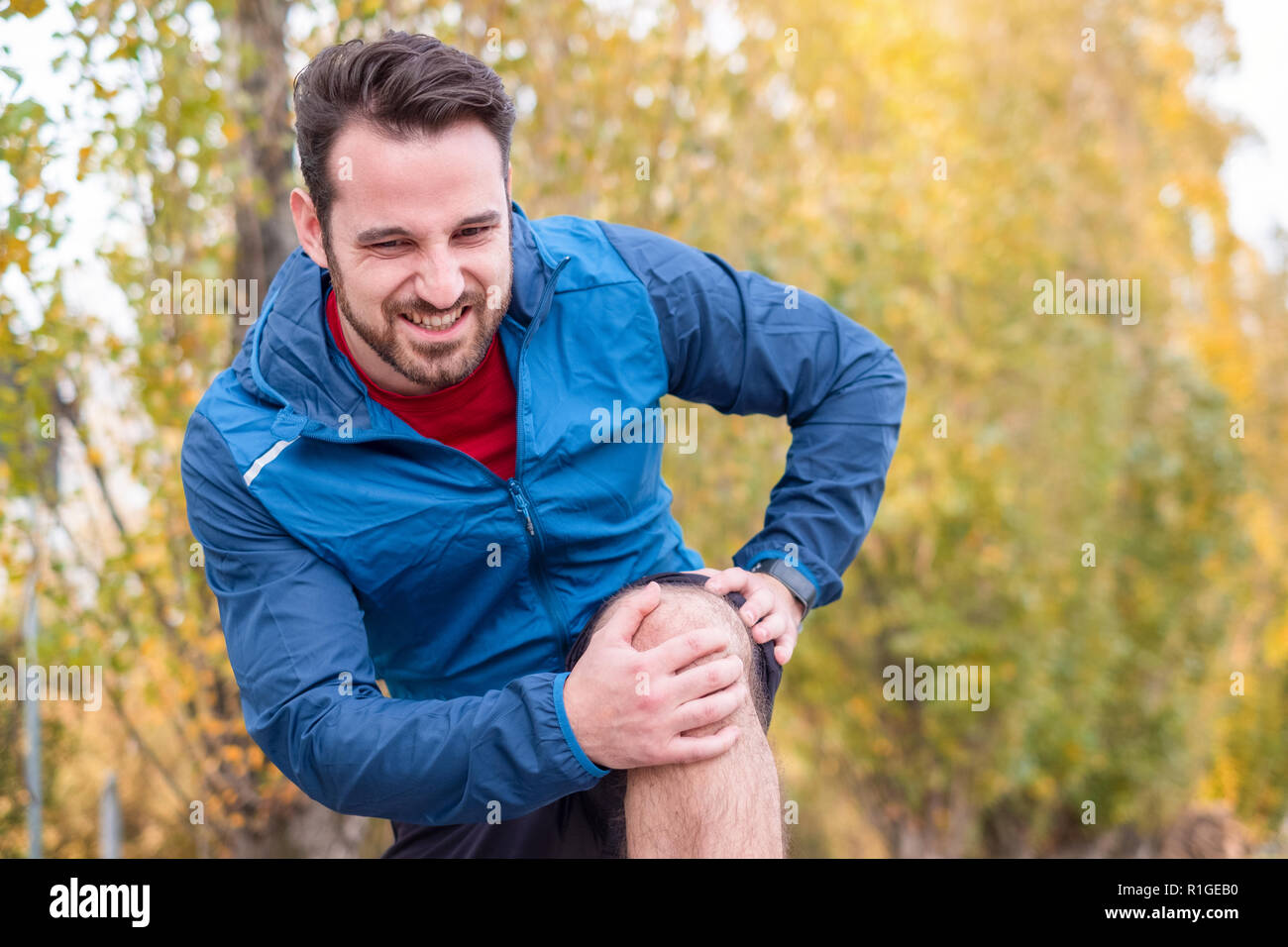 Athlete running outdoor and suffering for leg pain Stock Photo Alamy