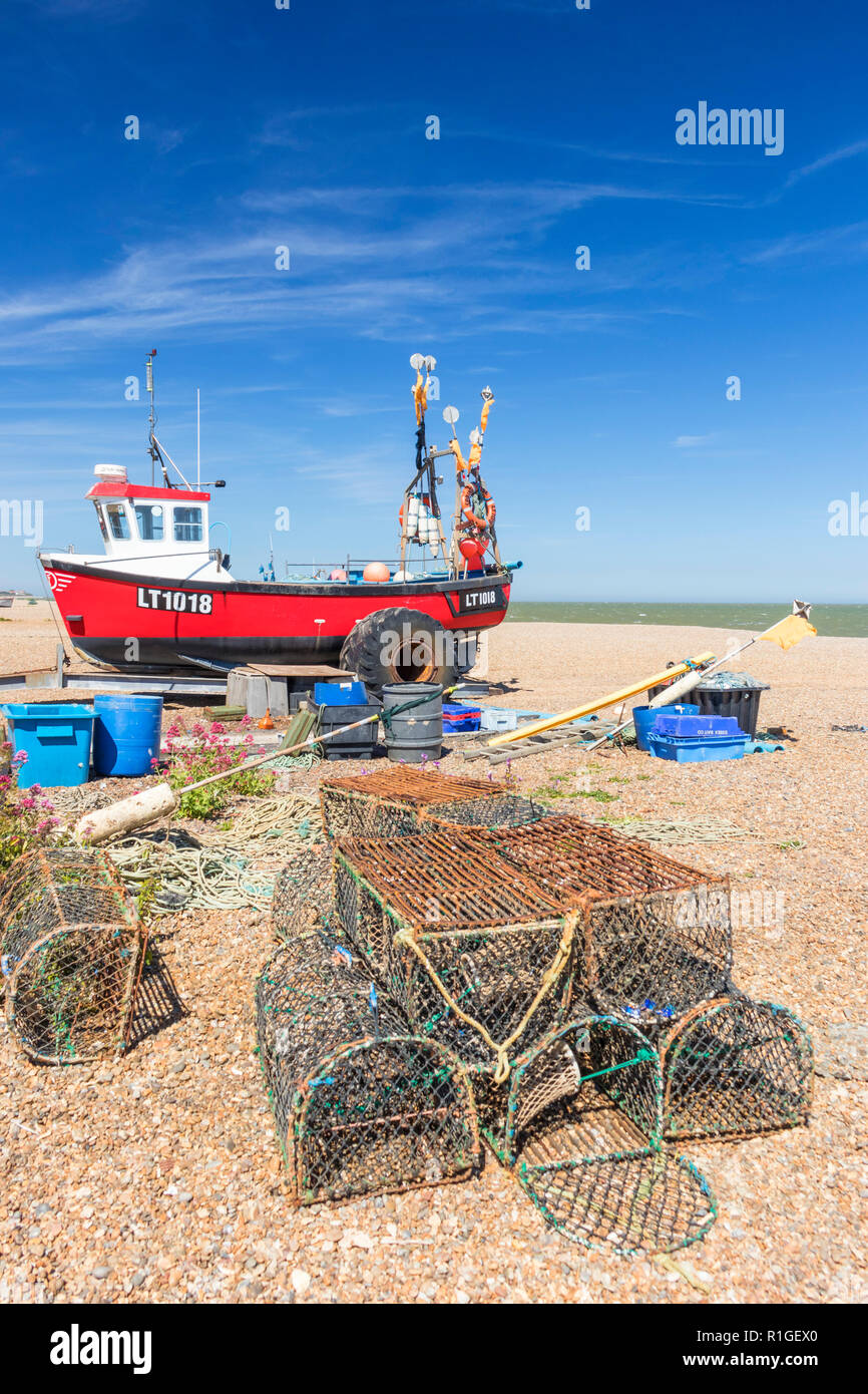 Aldeburgh Suffolk Aldeburgh traditional fishing boats and lobster pots on the beach at Aldeburgh beach Suffolk England UK GB Europe Stock Photo