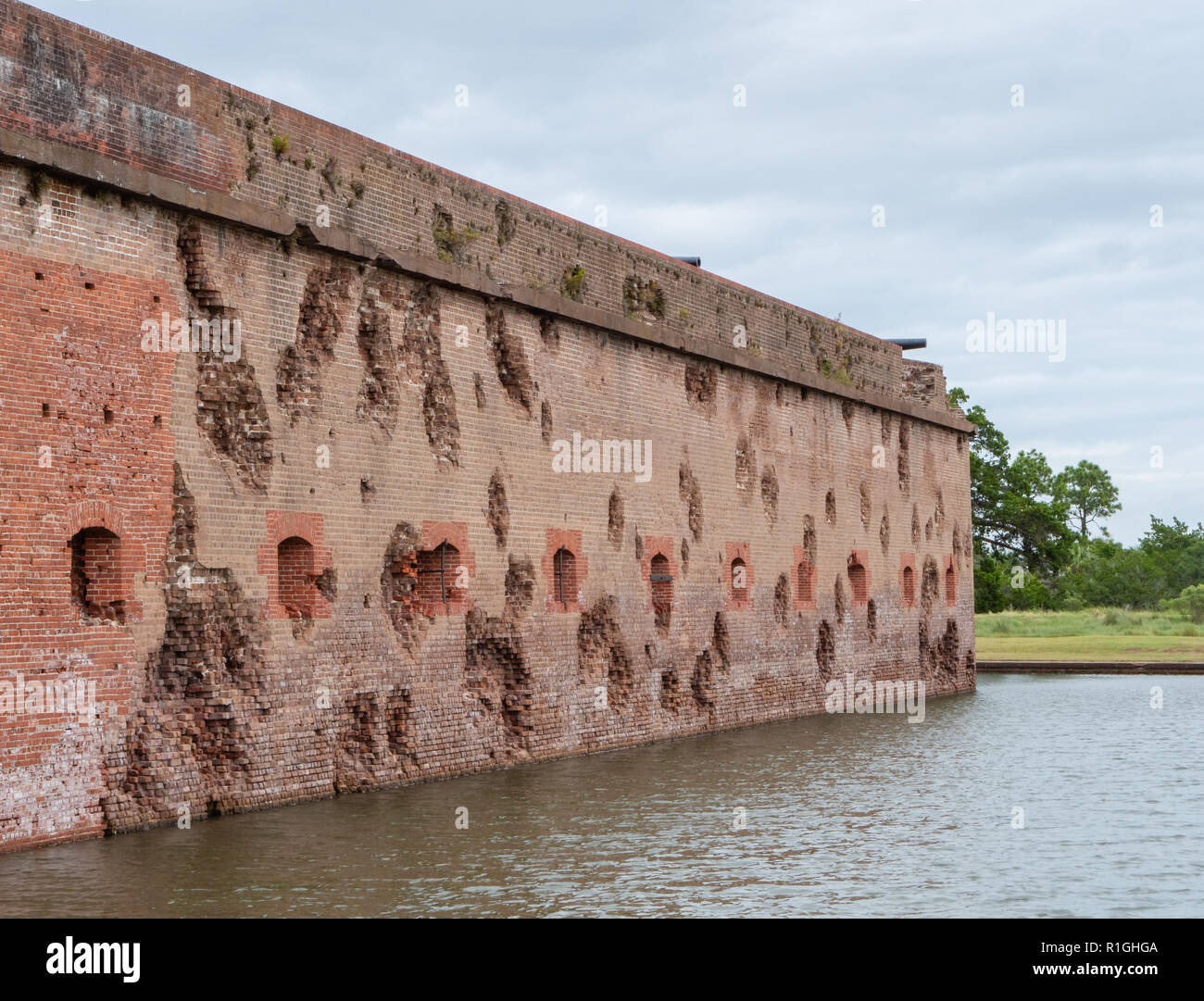 Rifled cannon shell damage at Fort Pulaski National Monument guarding the Savannah River in Georgia USA Stock Photo