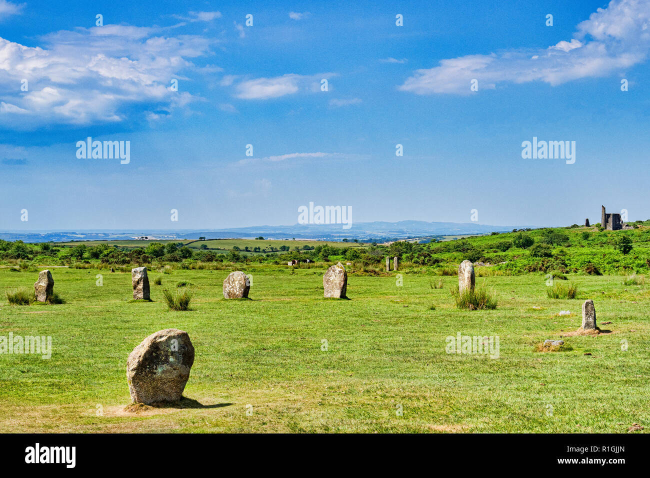 The Hurlers stone circle, one of a group of three on Bodmin Moor near Minions, Cornwall, UK. Remains of the Cornish tin and copper mining industry... Stock Photo