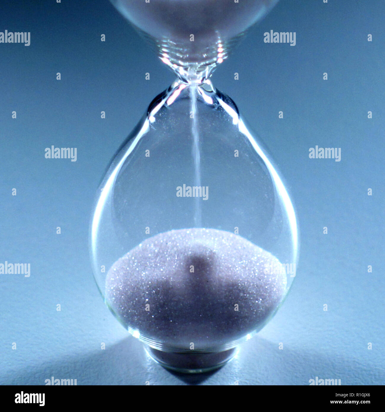 Photo of a isolated hourglass an ancient clock, an instrument for