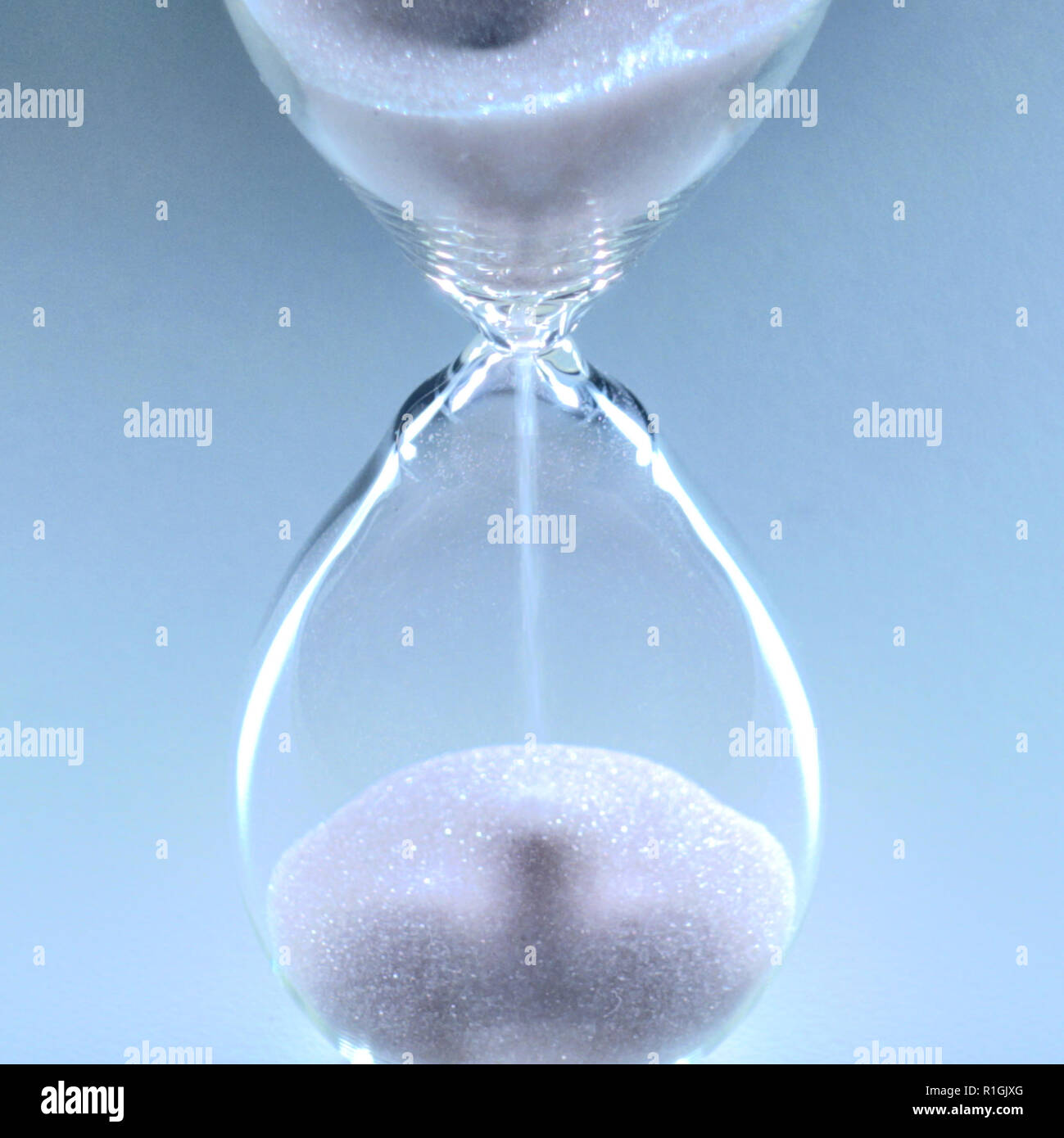 Photo of a isolated hourglass an ancient clock, an instrument for