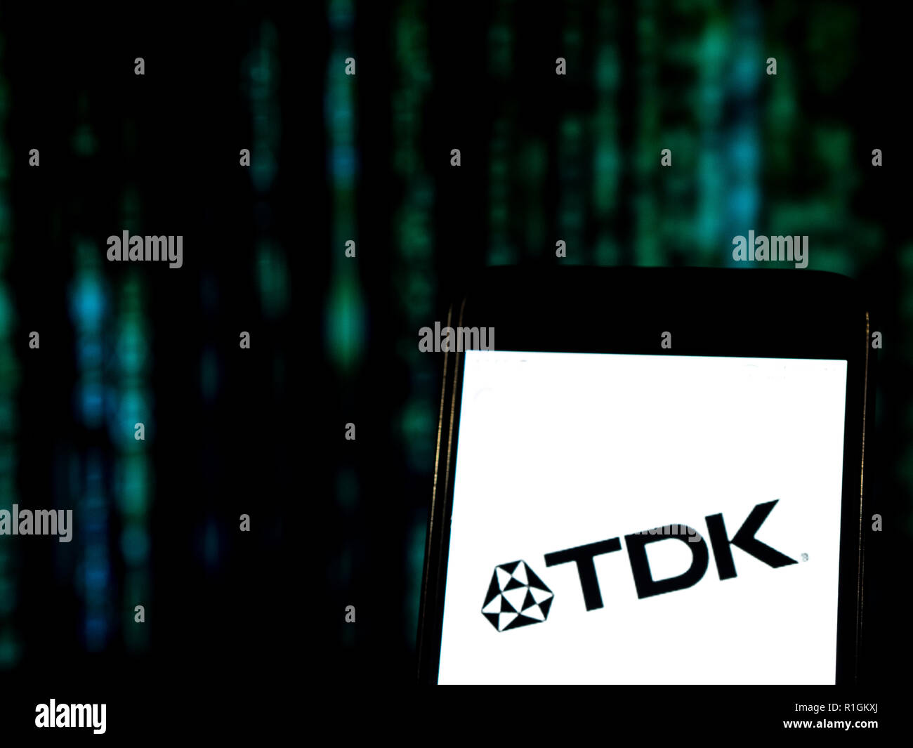 TDK Electronics company logo seen displayed on smart phone. TDK  Corporation, formerly TDK Electronics Co., Ltd, is a Japanese multinational  electronics company that manufactures electronic materials, electronic  components, and recording and data-storage