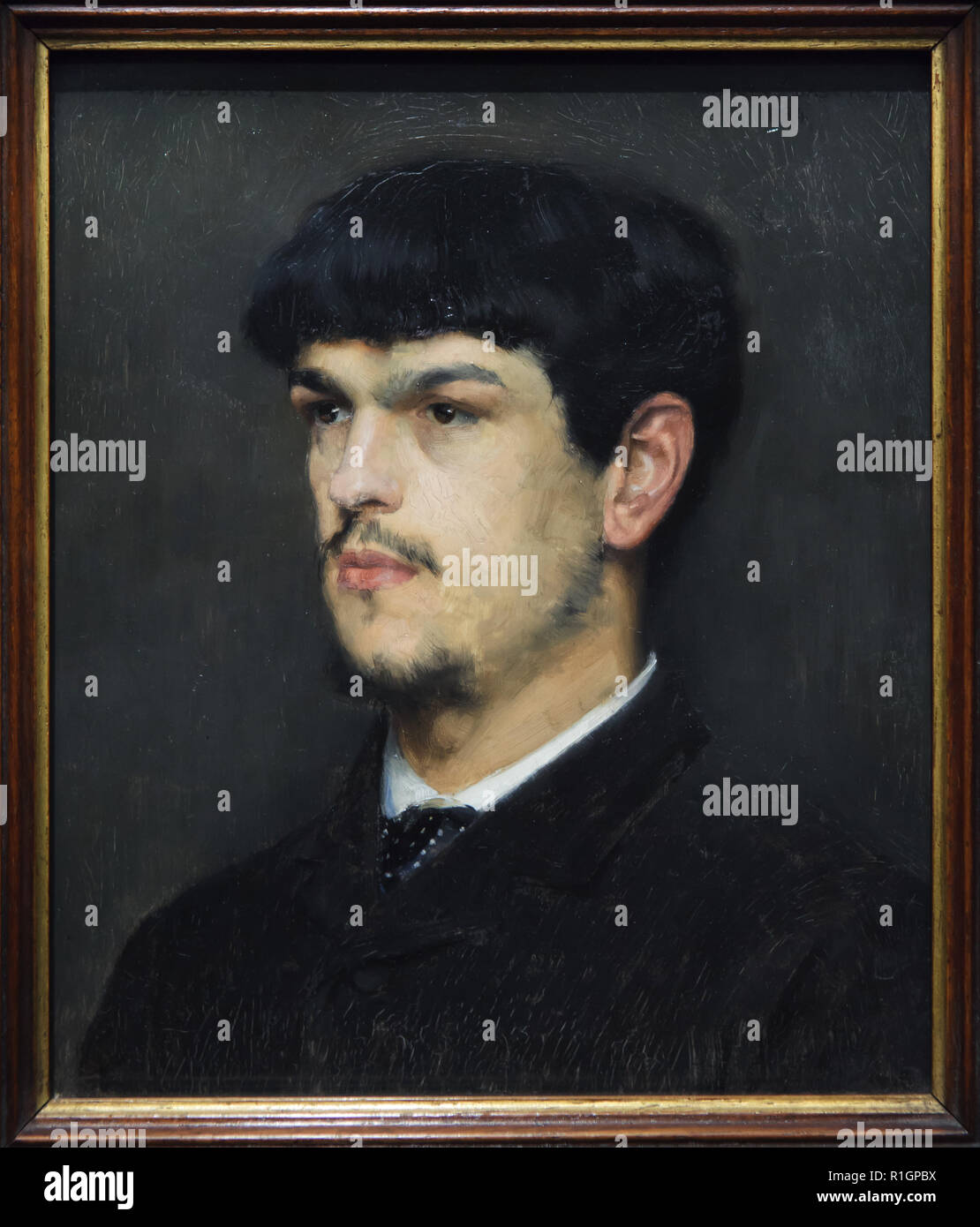 Portrait of French composer Claude Debussy by French painter Marcel Baschet (1884) on display at the exhibition devoted to Symbolism in the Baltic States in the Musée d'Orsay in Paris, France. Stock Photo