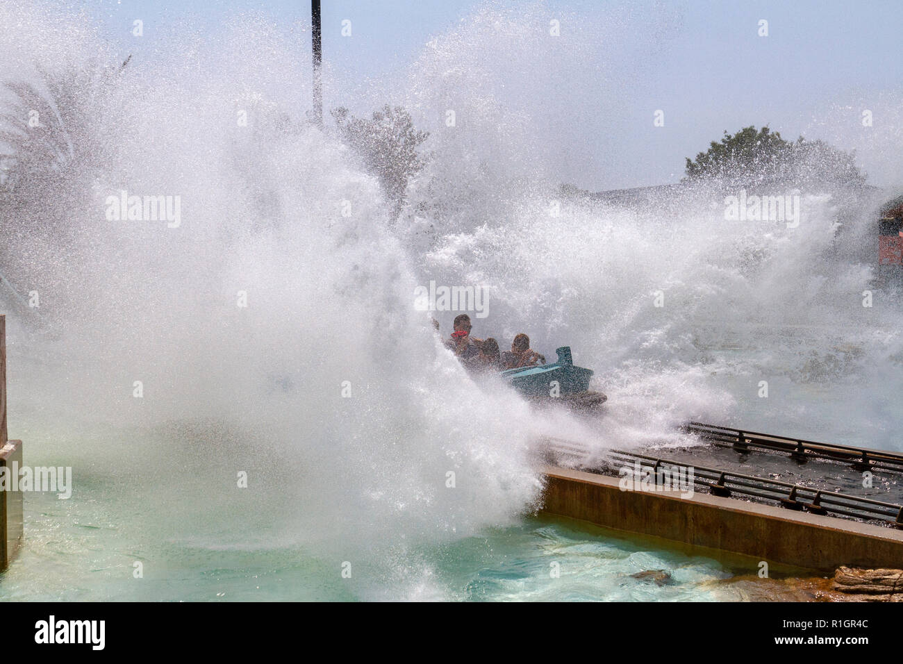 Visitors splashing down on the water slide ride in SeaWorld (Journey to Atlantis), San Diego, California, United States. Stock Photo