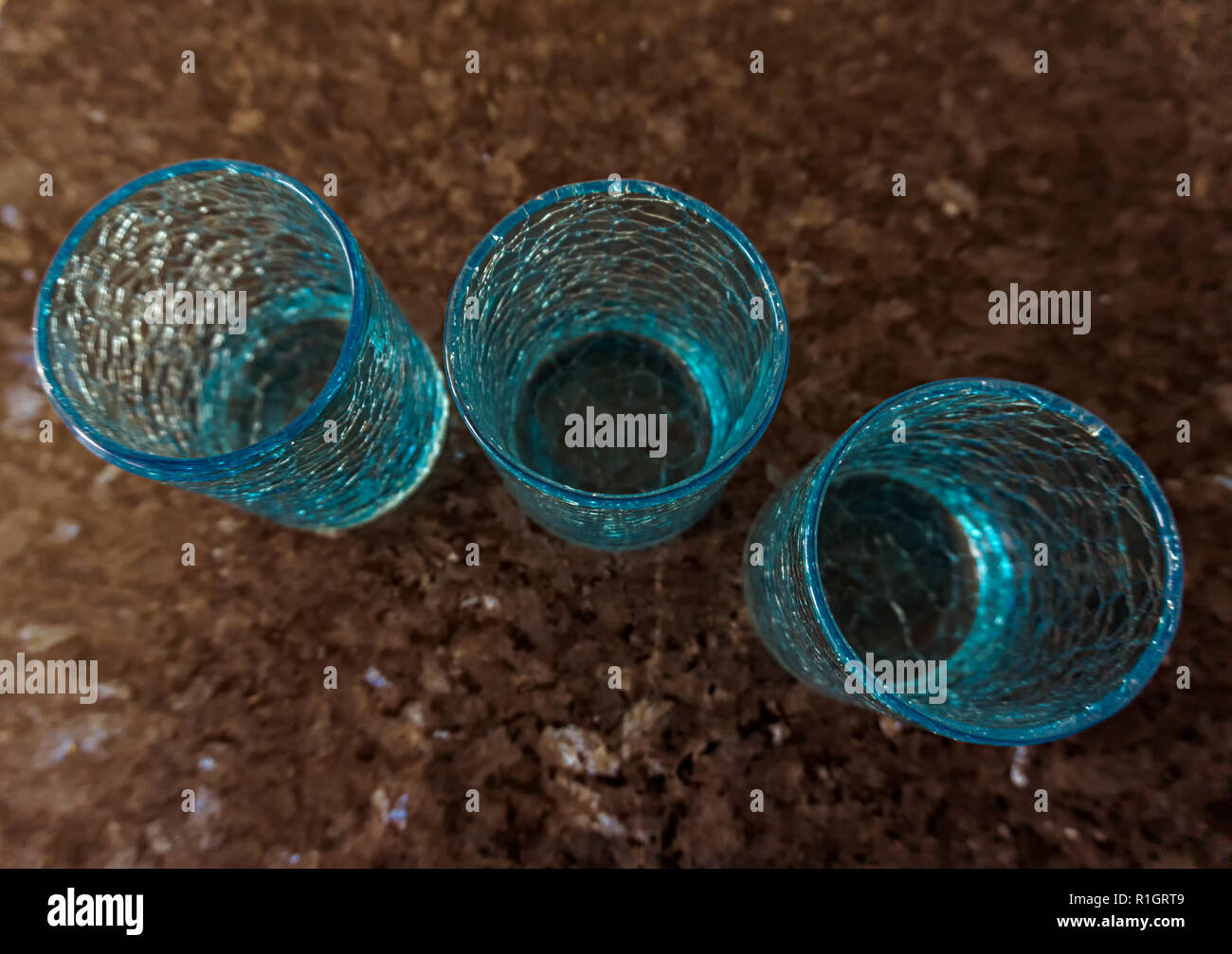 Three glasses on blue hi-res stock photography and images - Alamy