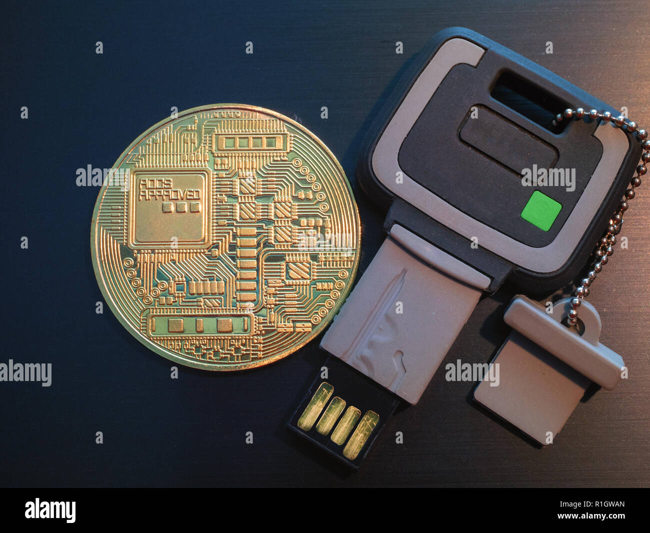currency coin with serucity wallet on usb stick flash drive with two authentication, biometric protection and strong encryption. flat la Stock Photo - Alamy