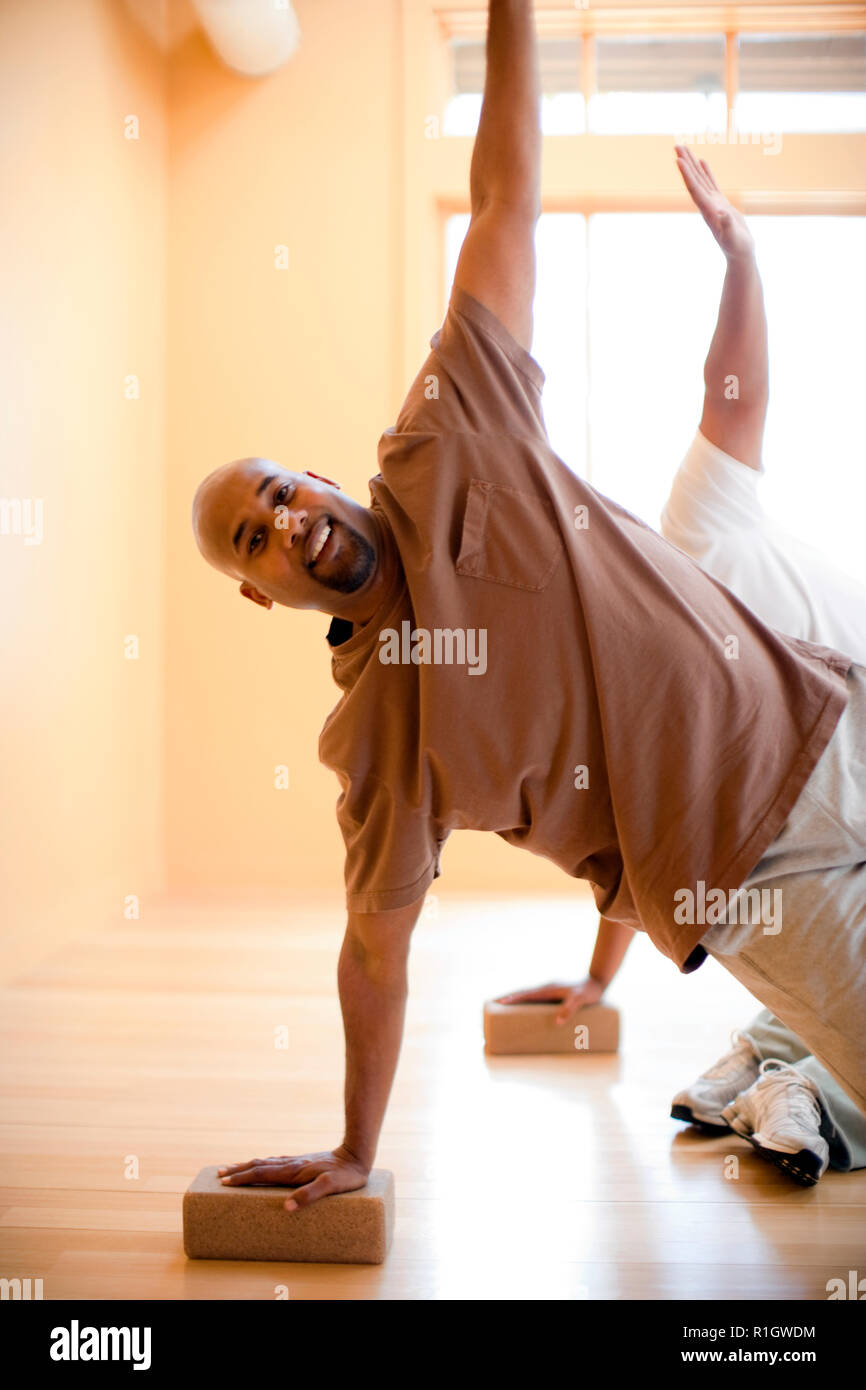 African american men stretching hi-res stock photography and images - Alamy