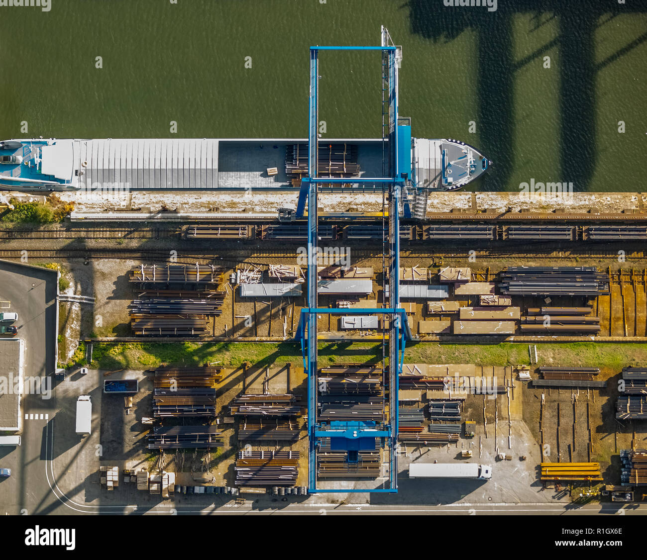 Aerial view, tube loading on a cargo ship, Duisport, Duisburg port, logistics, goods transport, goods transfer, inland shipping, Kasslerfeld, Duisburg Stock Photo