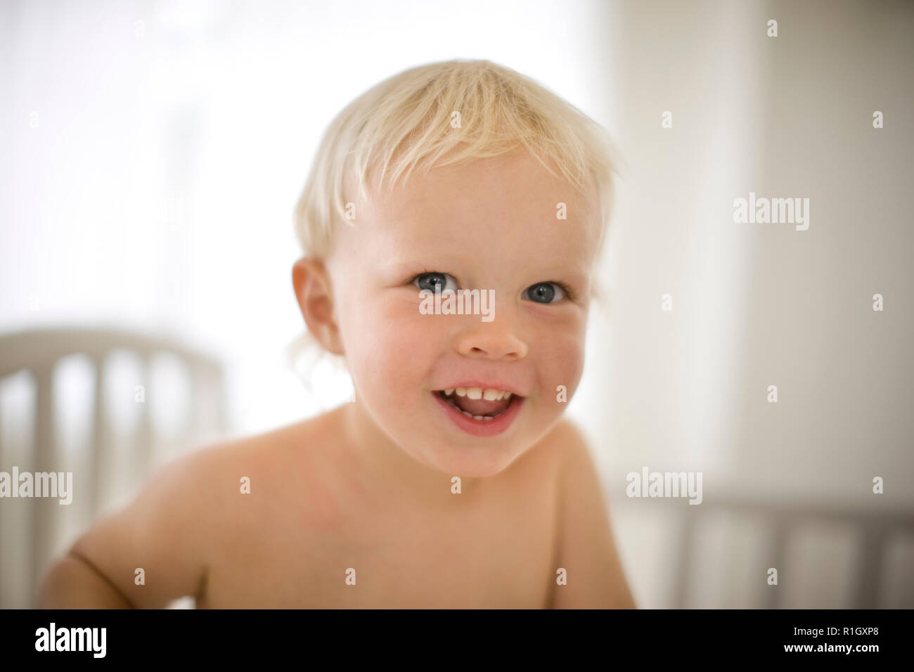 Portrait of a smiling young boy Stock Photo - Alamy