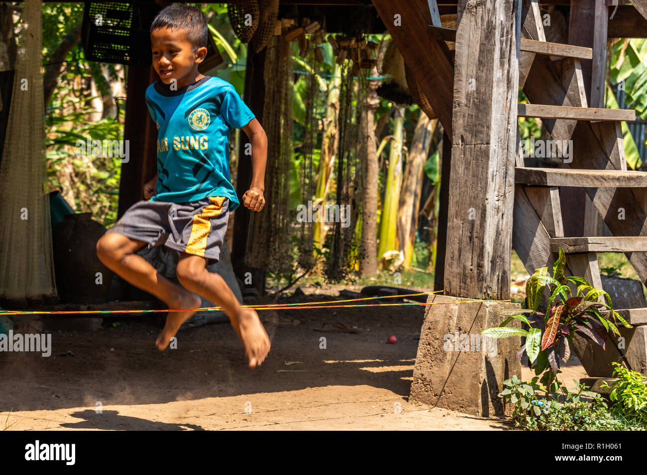 Kid boy jump rope hi-res stock photography and images - Alamy
