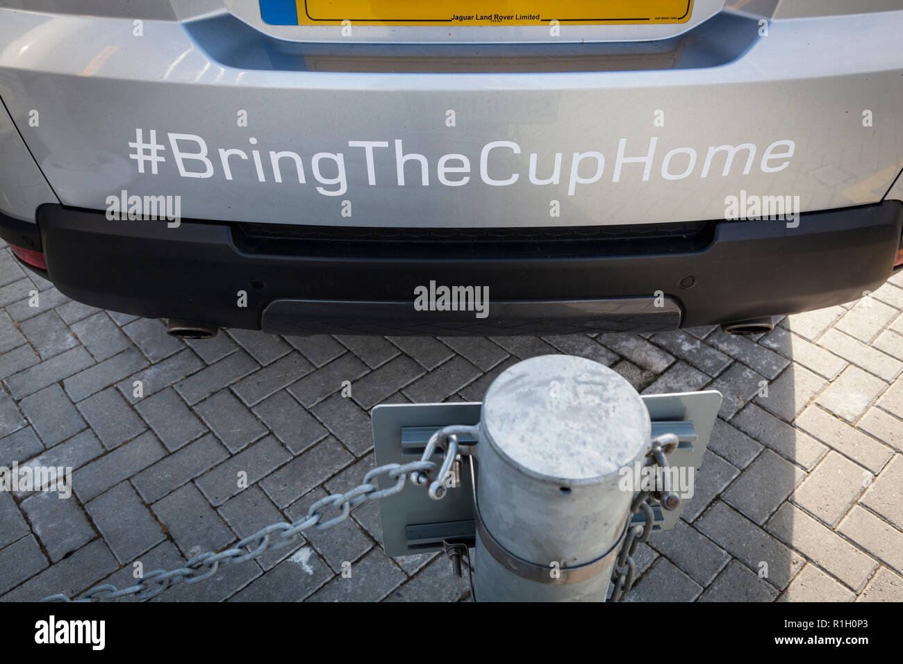 Close-up of the rear bumper sticker of a Land Rover supporting the 2017 UK America's Cup team to 'bring the cup home'. Stock Photo
