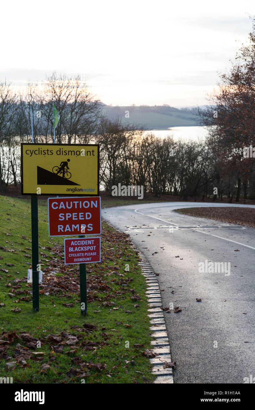 Warning signs for cyclists on a steep road around Rutland Water. Stock Photo