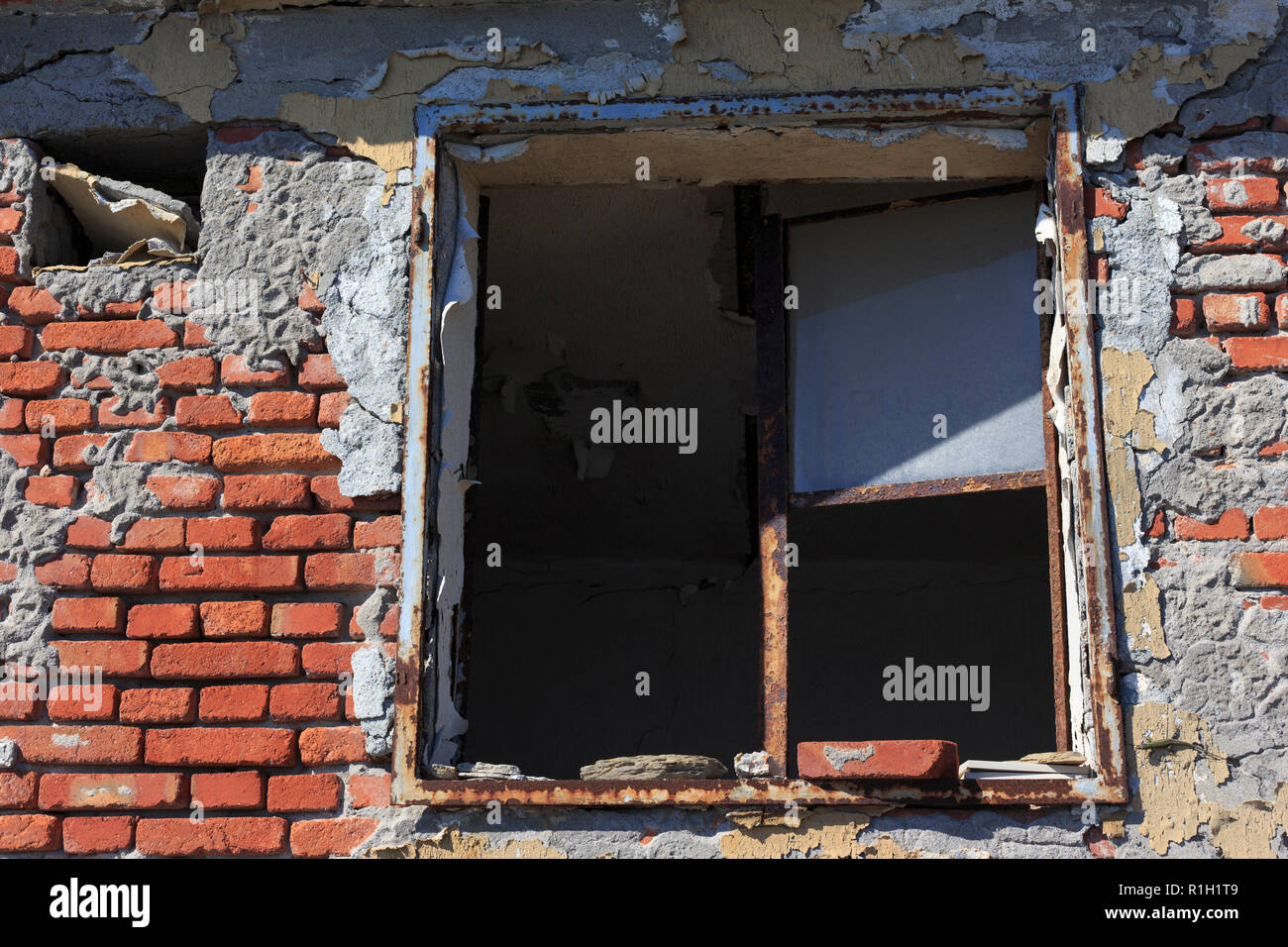 Red Brick Wall with rusty Window Stock Photo - Alamy