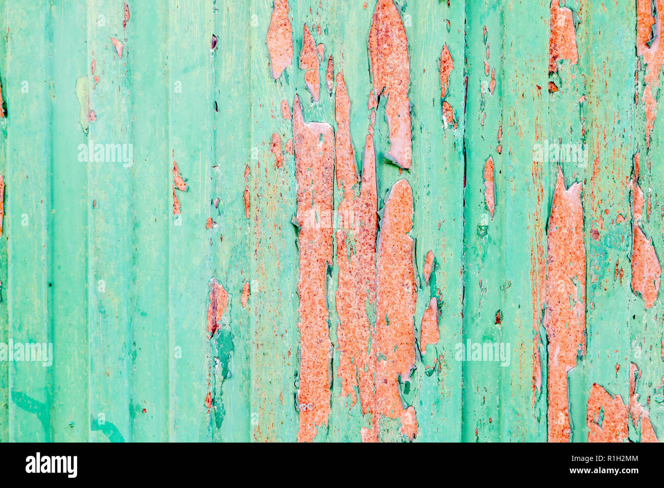 Green rusted metal door with peeling paint Stock Photo Alamy