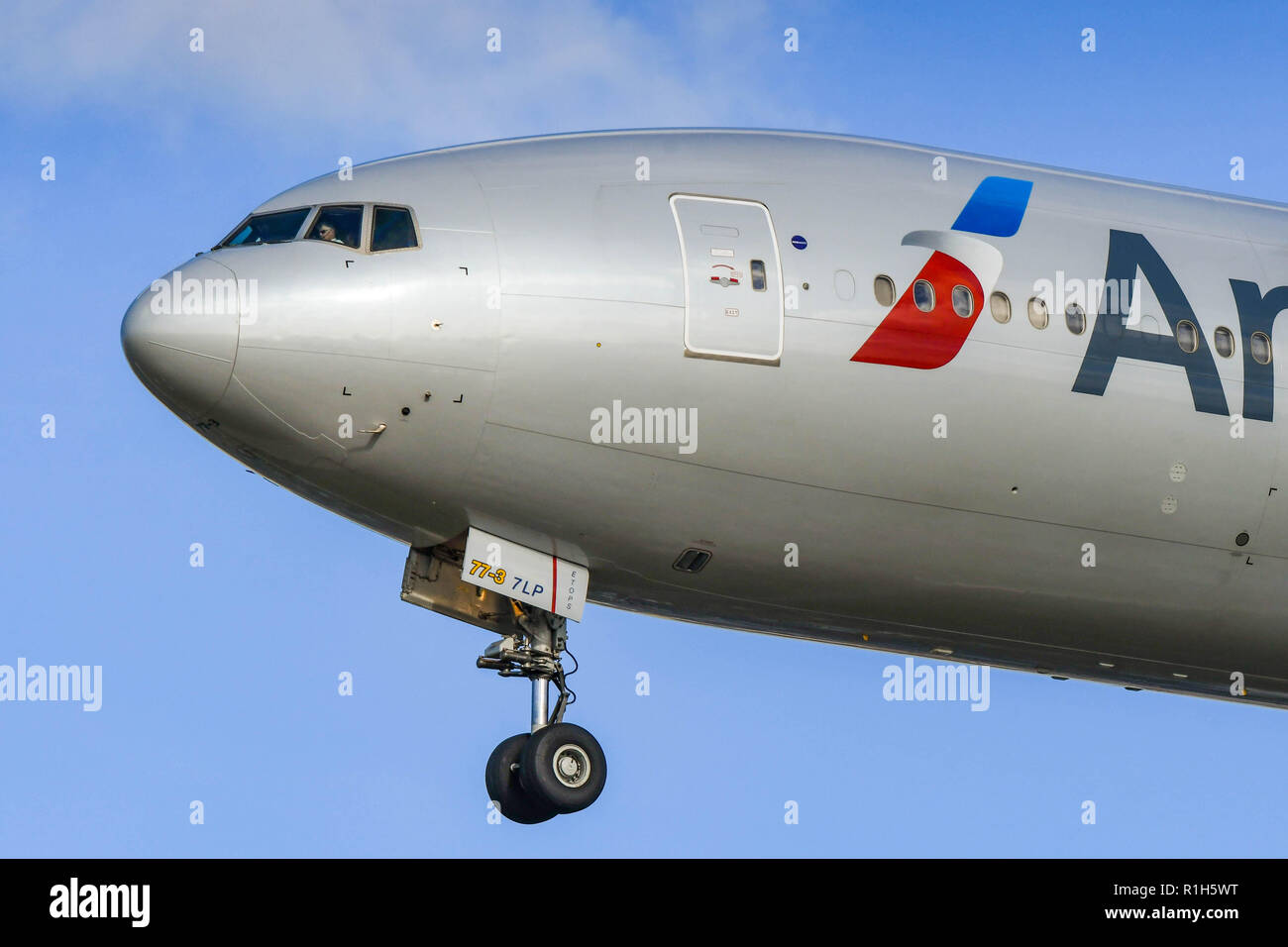 LONDON, ENGLAND - NOVEMBER 2018: Close up of the nose of an American Airlines Boeing 777 long haul airliner landing at London Heathrow Airport. Stock Photo