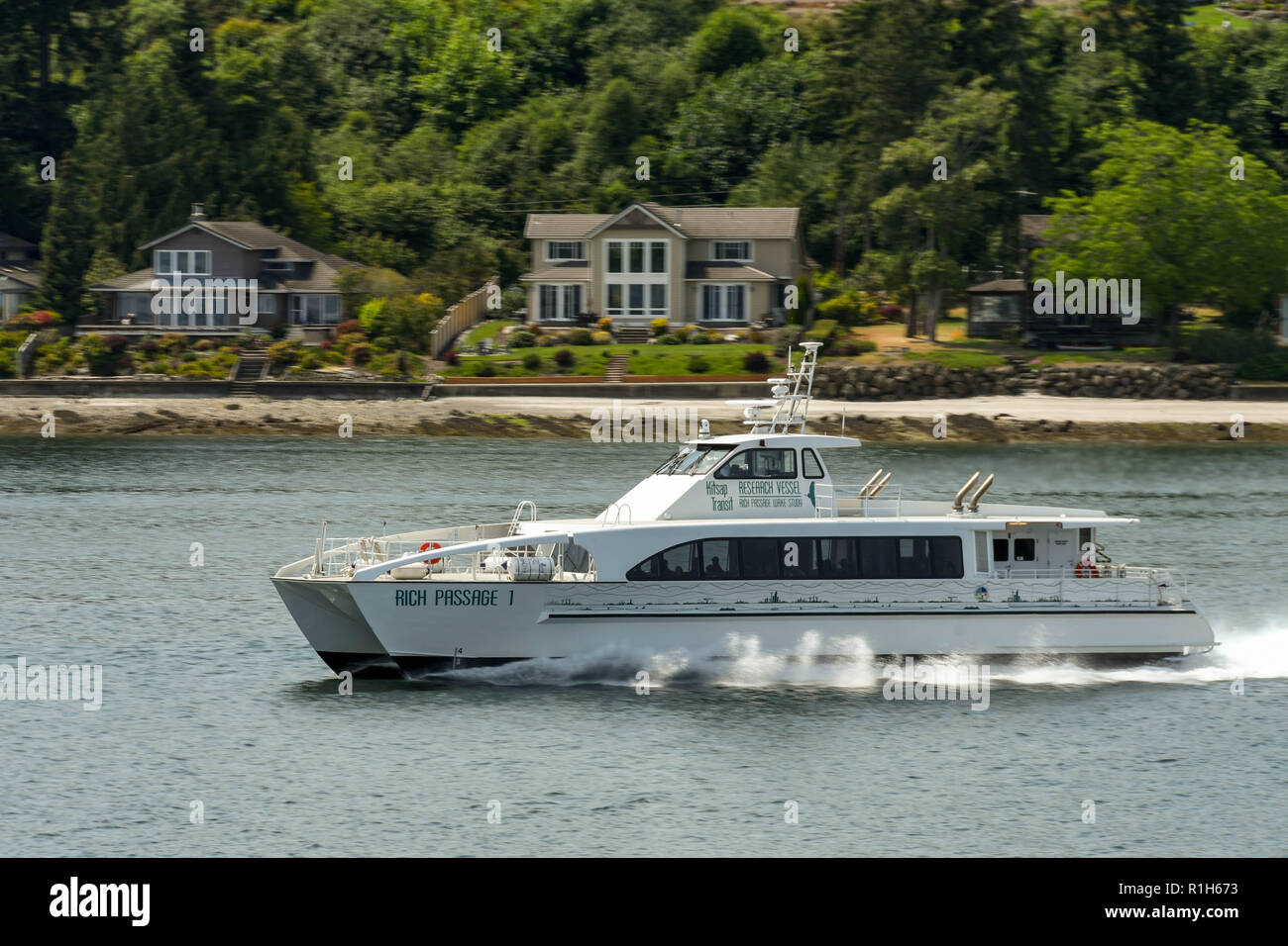 SEATTLE, WASHINGTON STATE, USA - JUNE 2018: High speed passenger ferry crossing Elliott Bay to Seattle. Stock Photo