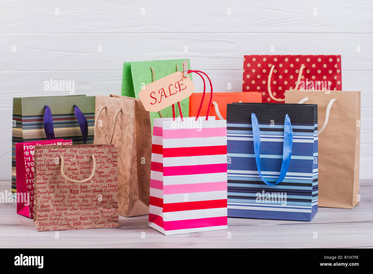 Multicolored paper shopping bags. Stock Photo