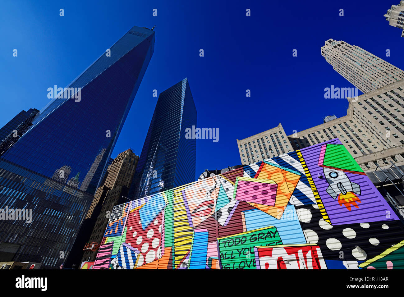 Building site with graffiti decorated walls in front of One World Trade Center Transportation Hub, Ground Zero, Manhattan Stock Photo