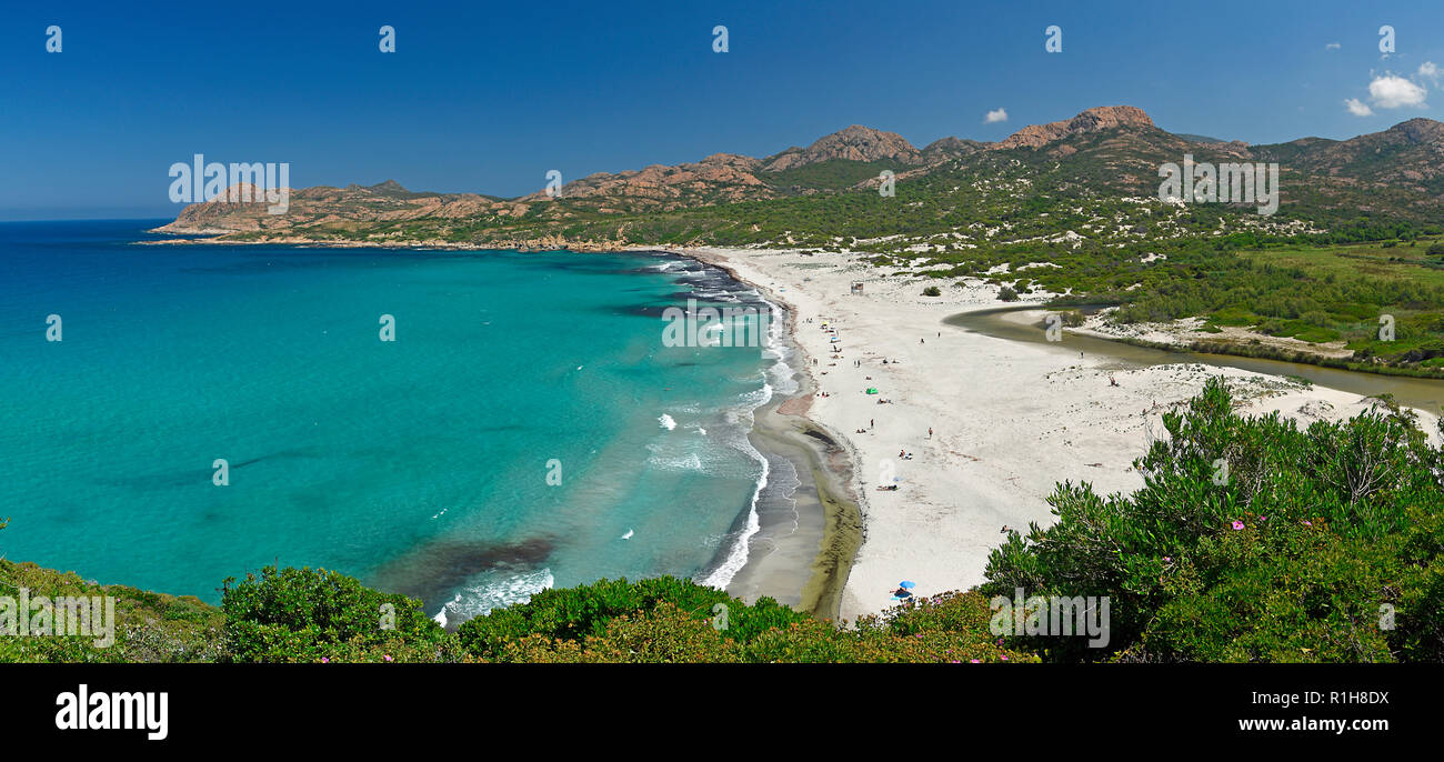 Turquoise-blue water on the sandy beach of Ostriconi, Ogliastro ...