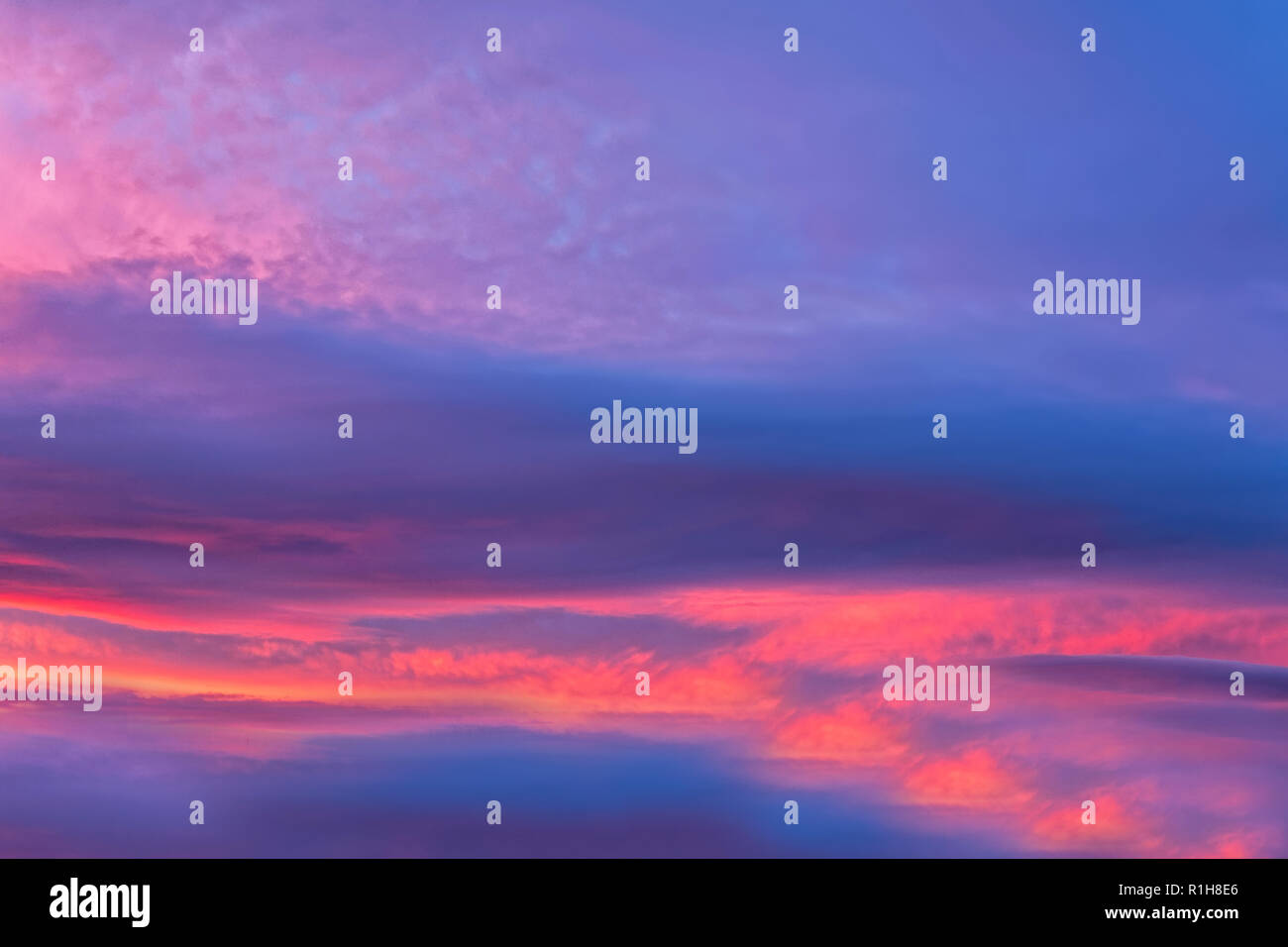 The sky with dark clouds illuminated by the setting sun Stock Photo - Alamy