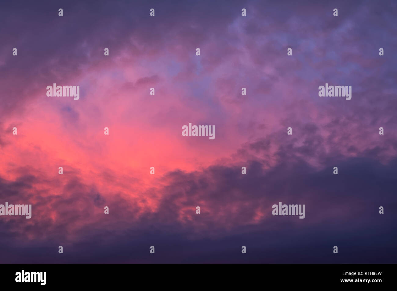 The sky with dark clouds illuminated by the setting sun Stock Photo - Alamy