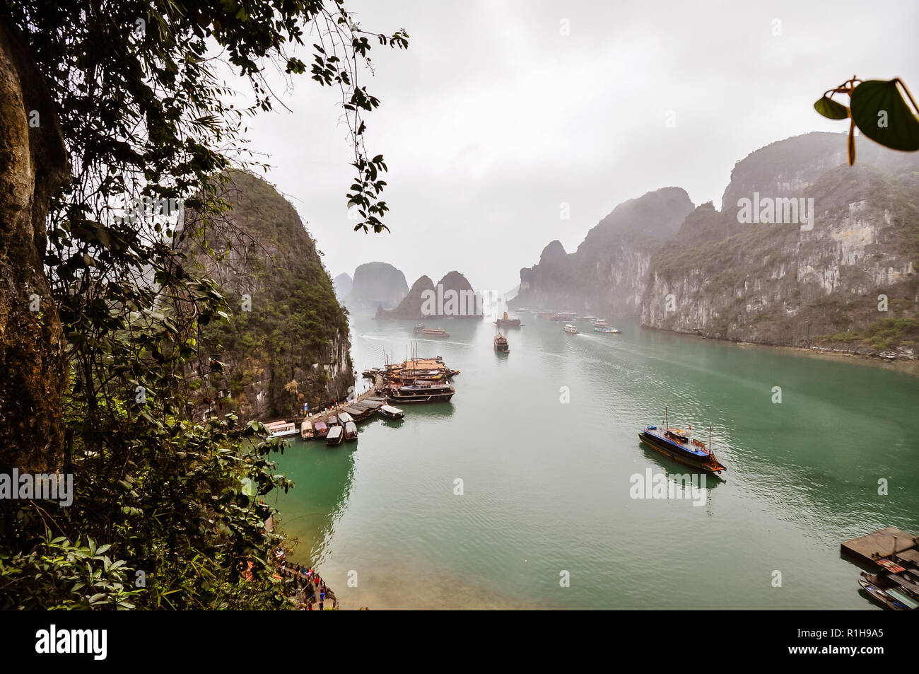 A Misty Day In Halong Bay Vietnam Stock Photo Alamy