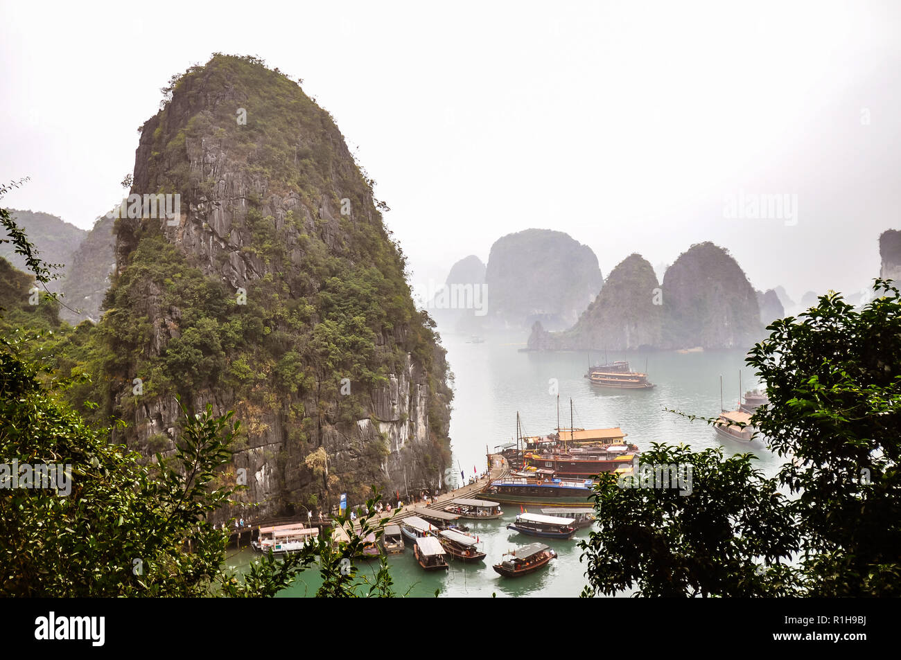 A Misty Day In Halong Bay Vietnam Stock Photo Alamy