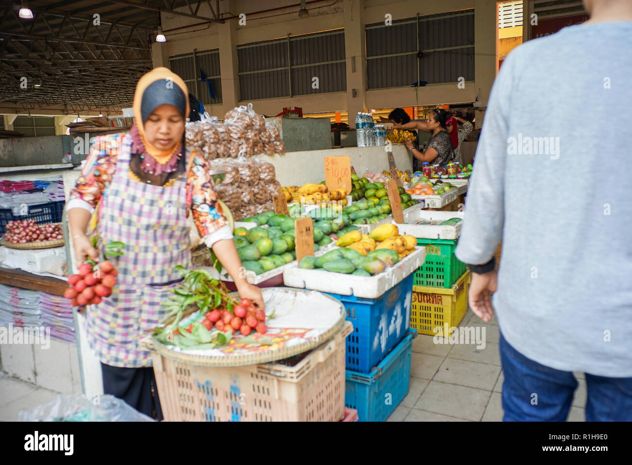 KELANTAN, MALAYSIA, 20 October 2018.The seller and the interior environment  of Siti Khadijah fresh market located in Kota Bharu, Kelantan, Malaysia Stock Photo