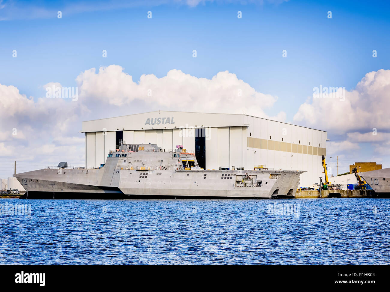 The USS Omaha (LCS 12), the nation's 12th littoral combat ship, is docked at Austal USA's ship manufacturing facility, in Mobile, Alabama. Stock Photo