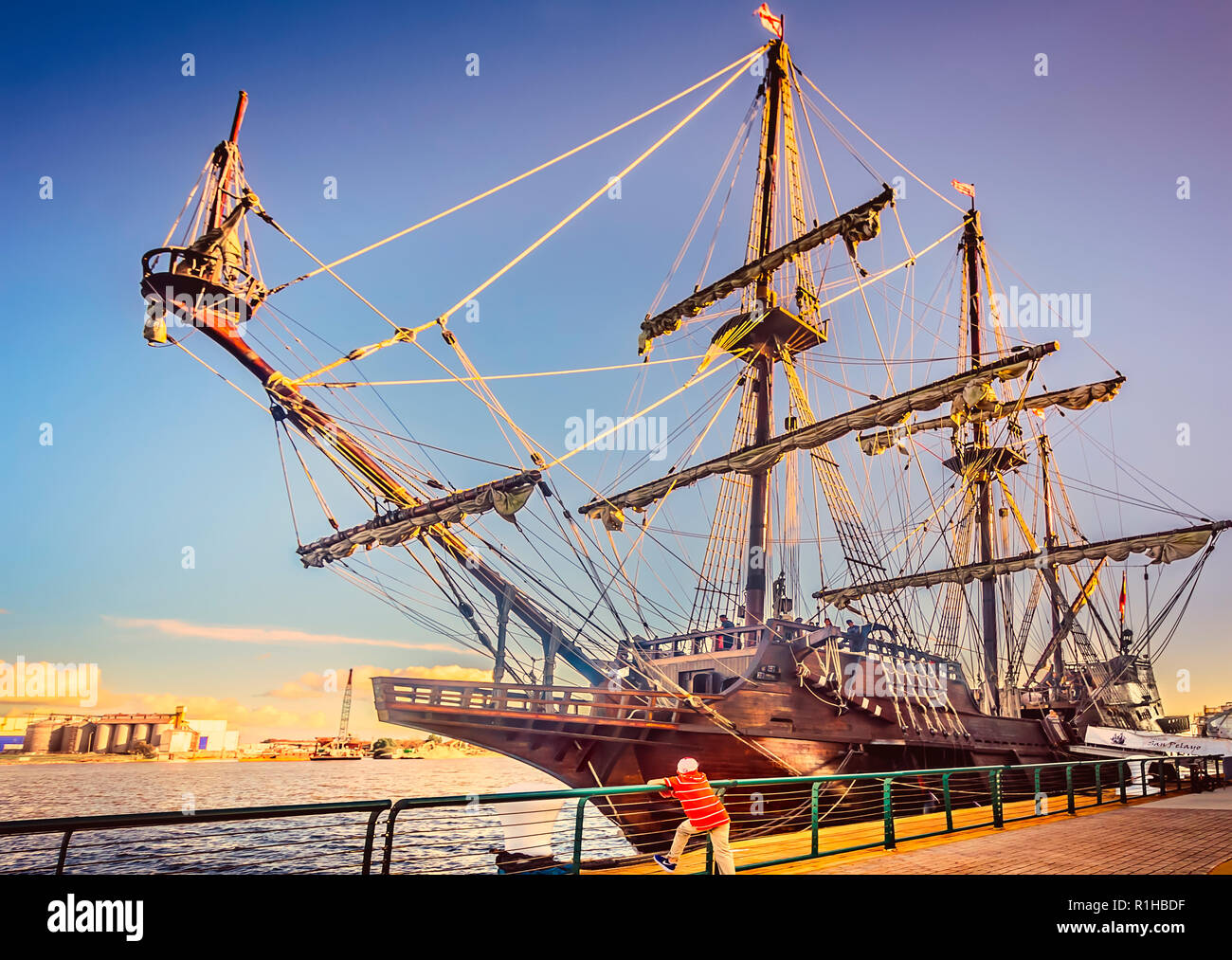 A young boy looks at El Galeon Andalucia, November 27, 2015, in Mobile, Alabama. Stock Photo