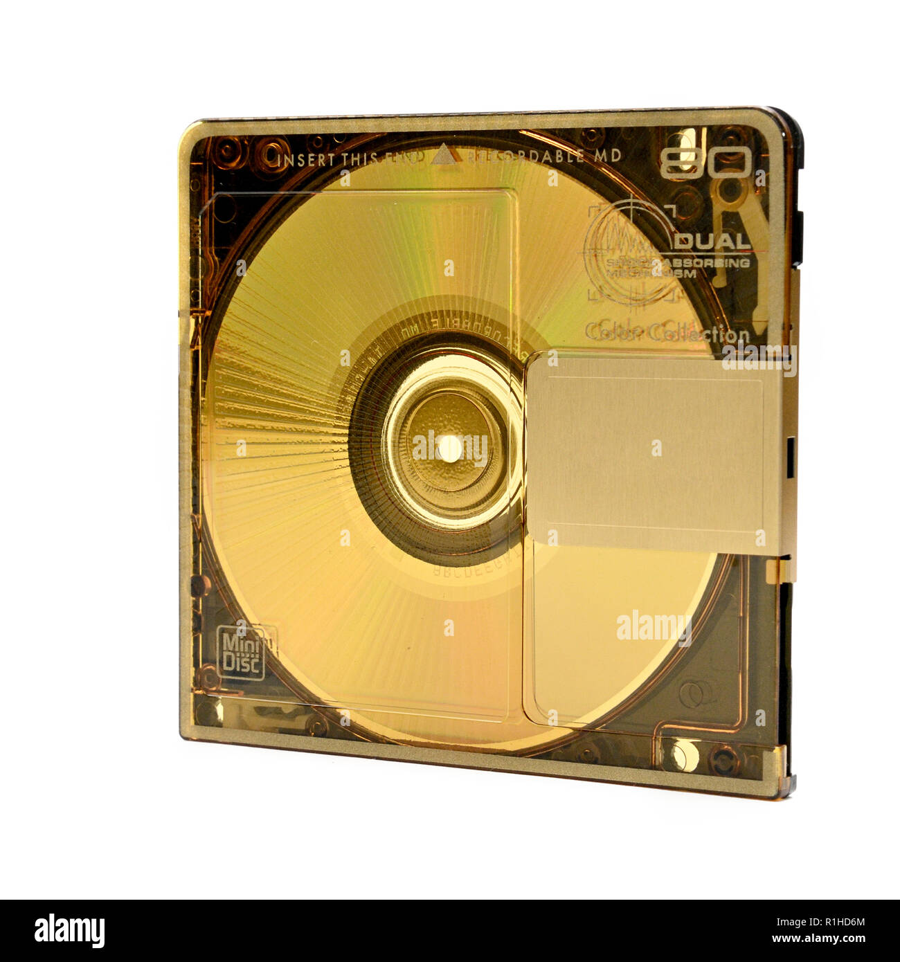 Compact rewritable Mini Disc- MD for digital recording released in the 90s on an isolated white background. Stock Photo