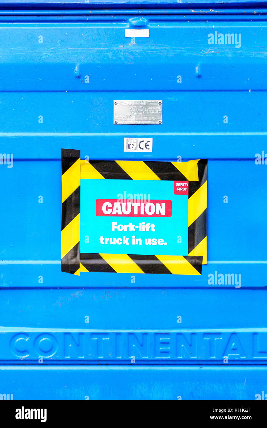 Caution sign warning of fork lift trucks in use Stock Photo