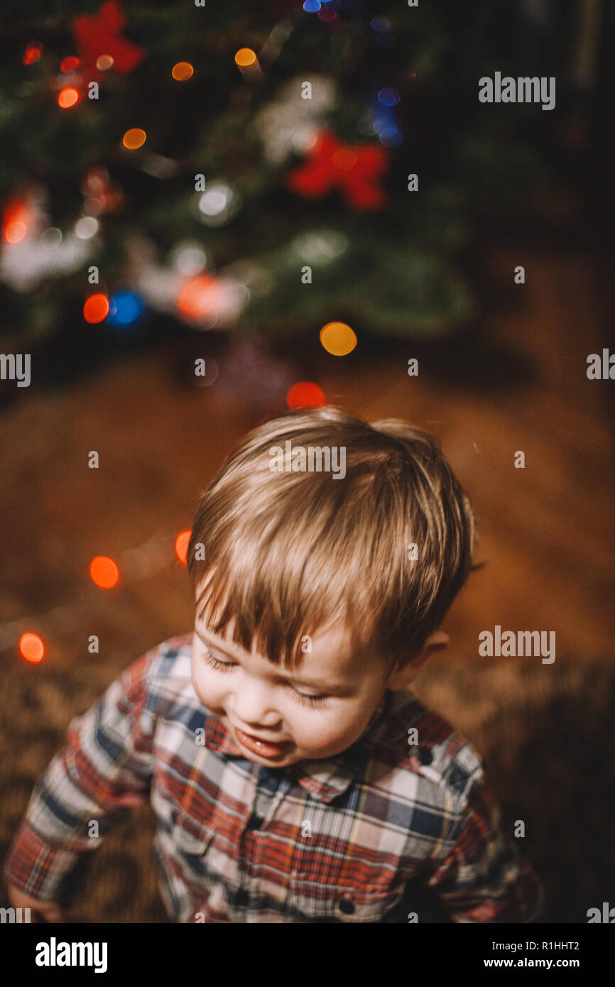 Baby boy playing at home during Christmas holidays Stock Photo