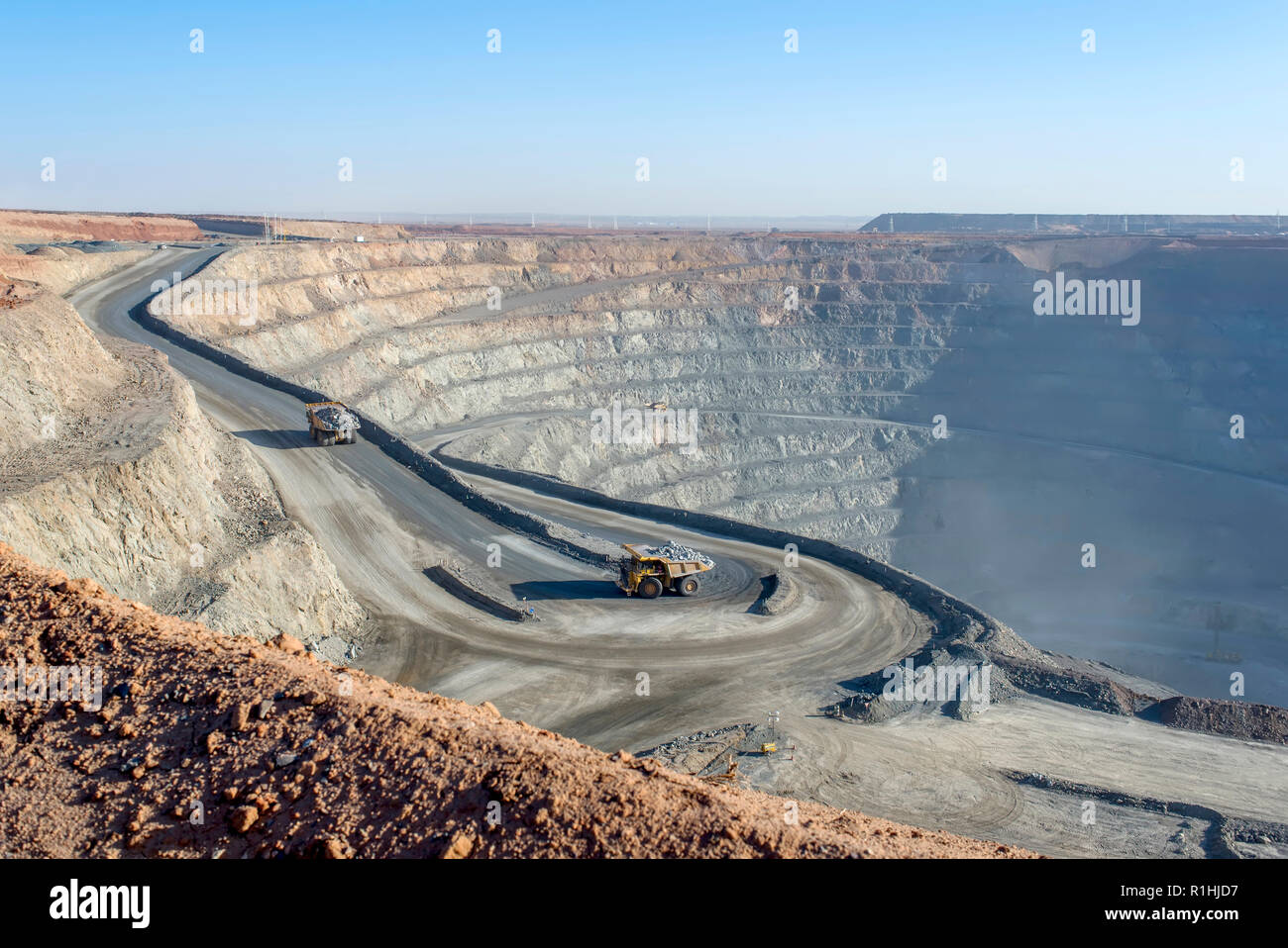 open pit mine in Mongolia, hauling trucks Stock Photo
