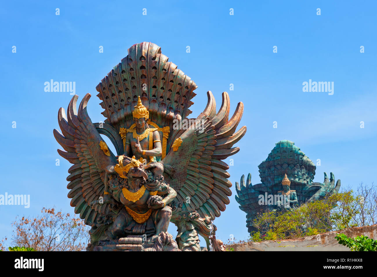 Landscape picture of Garuda Wisnu Kencana GWK statues as  Bali landmark with blue sky as a background. Stock Photo