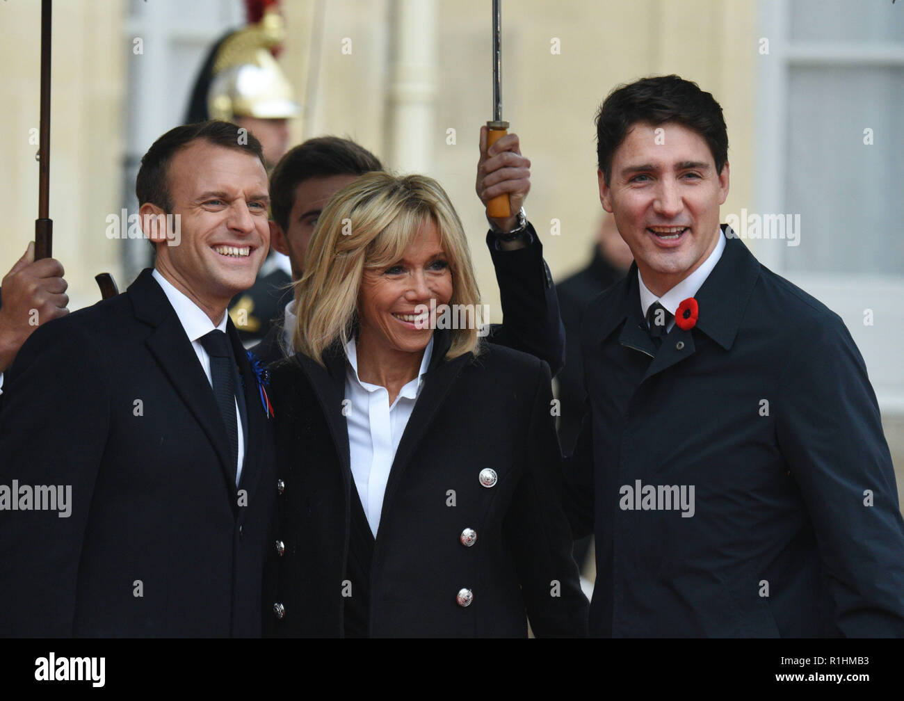 November 11 18 Paris France French President Emmanuel Macron L And His Wife Brigitte Macron Pose Canadian Prime Minister Justin Trudeau R At The Elysee Palace To Join The Armistice Day November 11 18 Paris France French President Emmanuel Macron L And His Wife Brigitte Macron Pose Canadian Prime Minister Justin Trudeau R At The Elysee Palace To Join The Armistice Day
