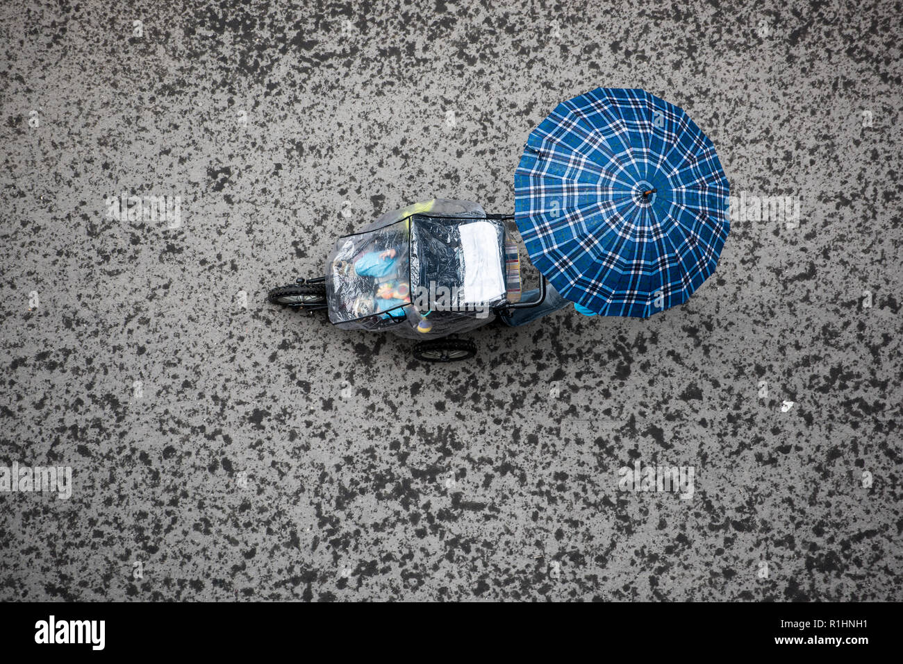 People in the Rain with Umbrella, Bird's eye view. People with Umbrella