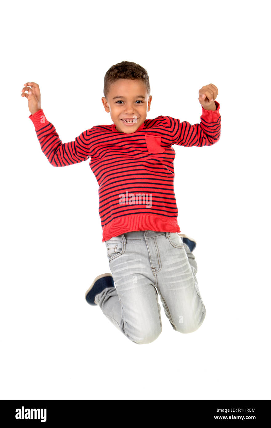 Happy latin child jumping isolated on a white background Stock Photo
