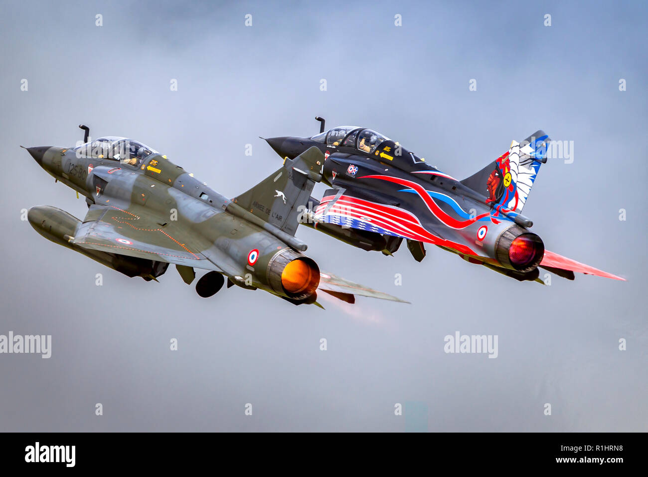 two France Air Force MIRAGE 2000 in flight. Photographed at Royal International Air Tattoo (RIAT) Stock Photo
