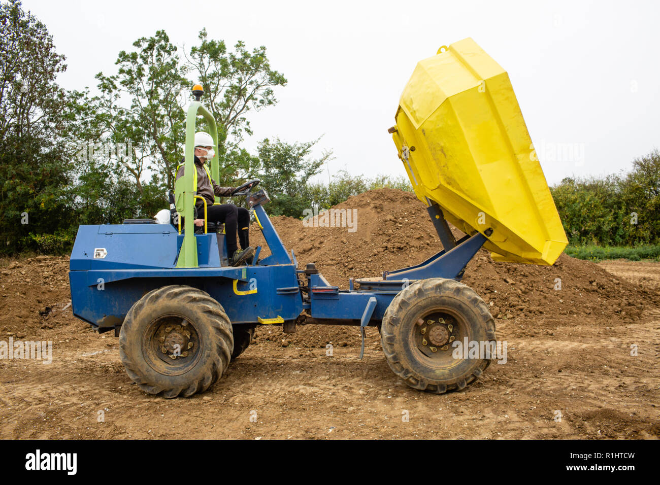Image of front dumper truck in construction site. Stock Photo