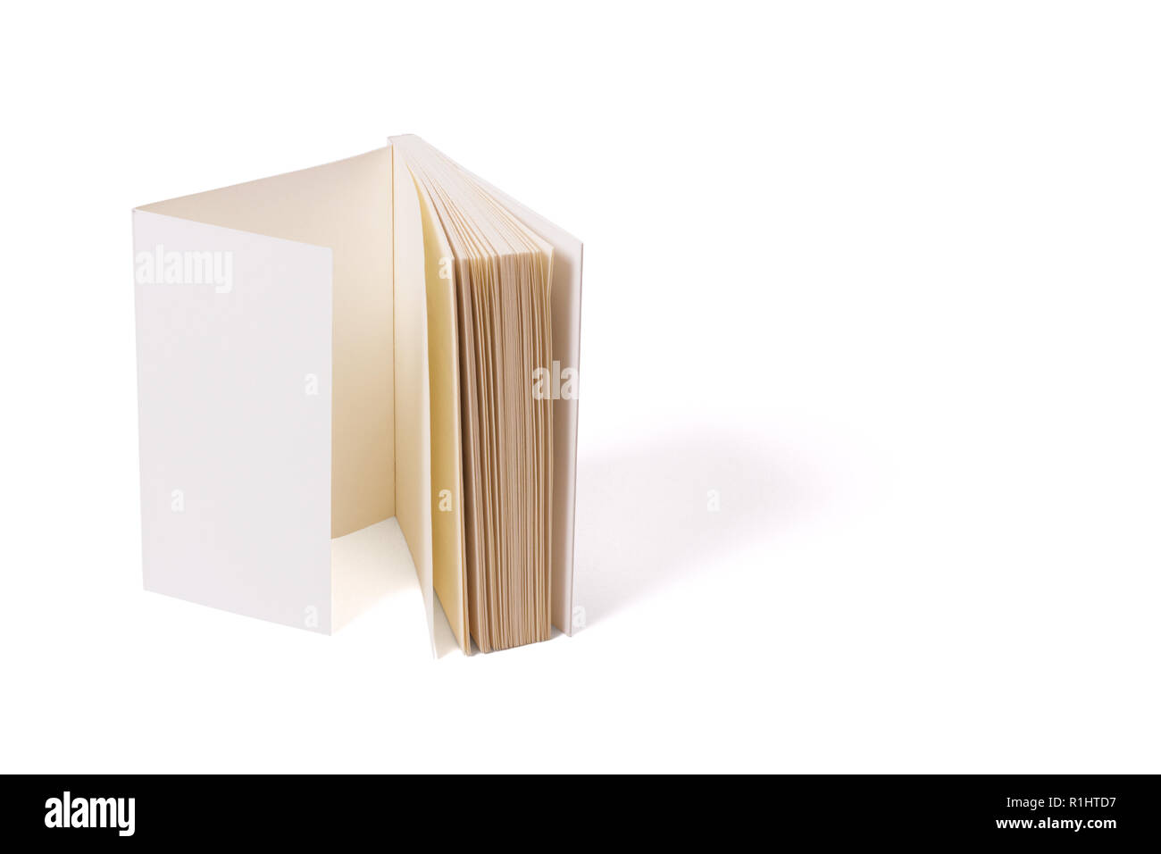 One opened hard cover notebook or magazine. Mockup of rectangular book. Flipping recycled paper. A lot of book pages in front of. Stock Photo
